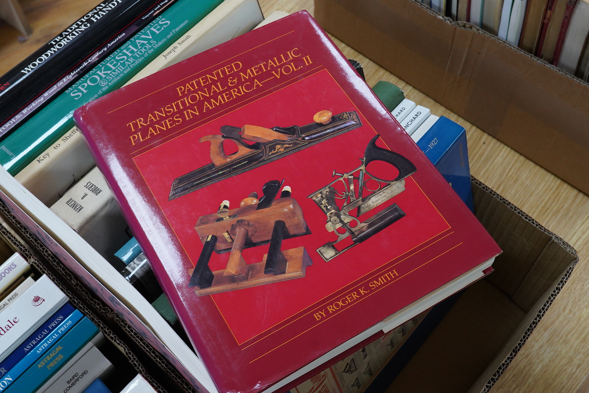 Two boxes of woodworking related books, titles include; Collins Complete Woodworker’s Manual, Buck & Hickman Limited catalogues, The Wooden Plane, The Handsaw Catalog Collection, Memories of a Sheffield Tool Maker, the S